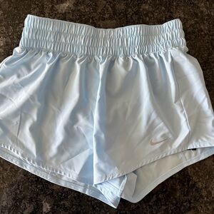 Nike Women's Pale Blue Athletic Shorts with Swoosh